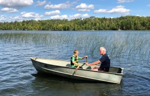Grandpa teaches Ben to row